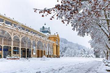 Main colonnade in winter with snow - spa city Marianske Lazne (Marienbad) - Czech Republic, Europe