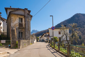 Historic stone houses in the mountain village of Cedarchis near Arta Terme in Carnia,...