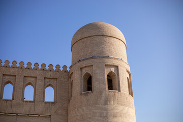 Fortress wall side building made in a brownstone, Khiva, the Khoresm agricultural oasis, Citadel.