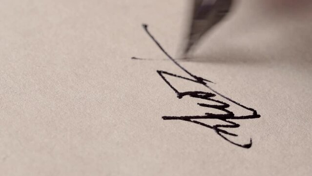 Signature on old paper with vintage fountain pen