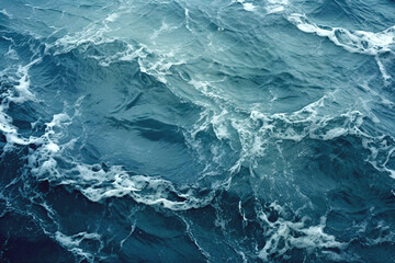 Obraz premium Stormy Ocean Waves, Top View. Showcasing Deep Blue Hues With White Foam. Ideal For Backgrounds Or Abstract Nature Themes. AI Generated