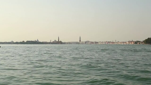 Approaching Venice, Italy by boat in summer