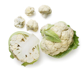 Cauliflower, half and pieces on a white background. Top view