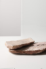 Flat stone pedestal on white background, textured template for mock-up, banner. Minimalism concept, empty podium display product, presentation scene