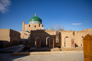 Fototapeta na wymiar structure in the top with a golden point, Khiva, the Khoresm agricultural oasis, Citadel.