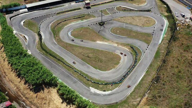 Aerial view race karting track, kart track for auto racing top view, Car race asphalt and curve grand prix street circuit, Drone view asphalt race track