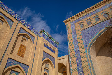 Obraz premium a colorful reflections of historical building inside the Fortress, Khiva, the Khoresm agricultural oasis, Citadel.