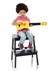Child, portrait and guitar for music learning lesson or rhythm education, hobby or isolated...