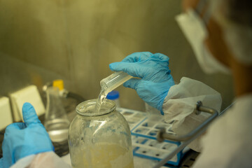 multiple patient samples are disposing in glass jar
