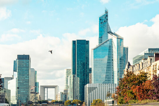 France, Ile-De-France, Paris, Modern skyscrapers in La Defense district withGrande Arche in background