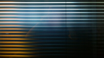 metal blinds with dark reflection