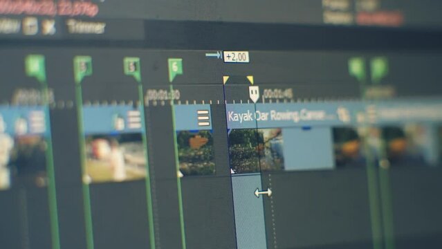 Content creator video editor editing footage in post production company	