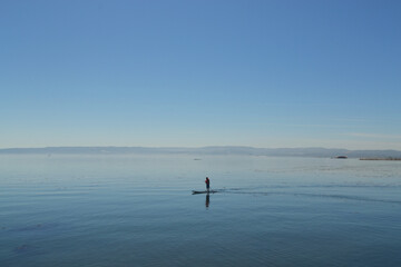 doing paddle board in the pacific ocean in Chile