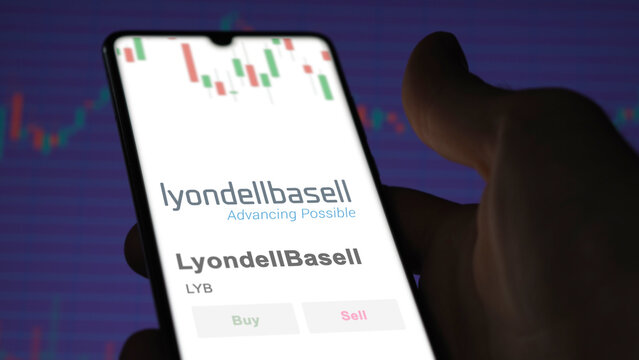 The logo of LyondellBasell on the screen of an exchange. LyondellBasell price stocks, $LYB on a device.