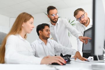 Fototapeta premium Business team working on their business project together at office.