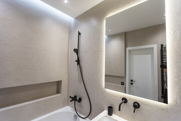 Bright elegant bathroom interior in a luxury house