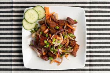 Roasted pork on a white plate