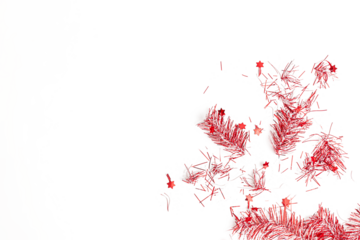 flatlay of christmas party with red streamers on white background, top view