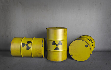Drei radioaktive Fässer vor einer Betonwand - 685674845