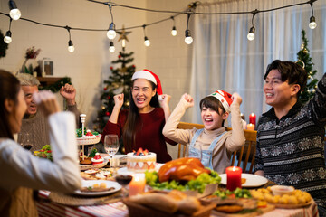 Merry X-mas happiness yeah and raise hand when Asian family including parent, child girl, senior...