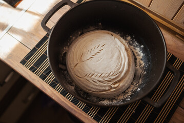 Ready for baking bread loaf in pan. Baking bread at home following old ukrainian traditions