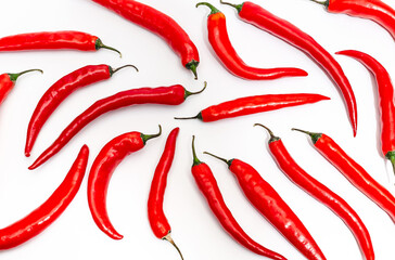Hot chili pepper circle long shape on white background. Many pods in a symmetrical pattern.