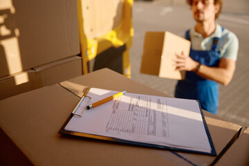Closeup delivery document or application form for package receiving