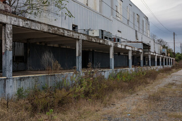Remains of the loading dock of an abandoned factory in the rural south