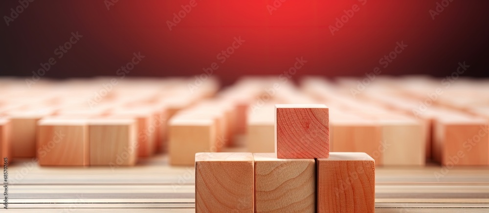 Poster Closeup of a unique red wooden cube among blocks Copy space image Place for adding text or design