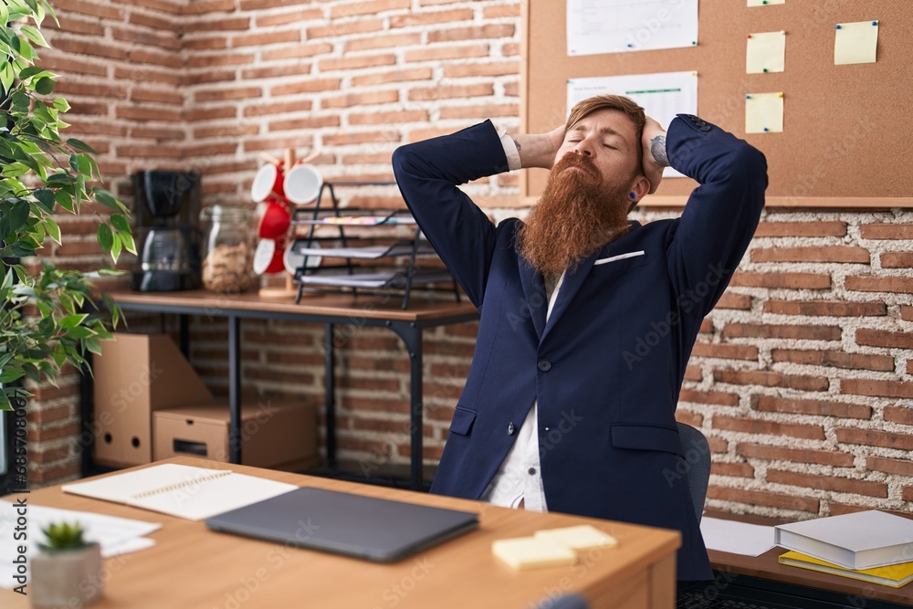 Sticker young redhead man business worker relaxed with hands on head at office