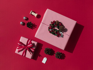 Christmas or New Year pink gift boxes concept composition. Winter holiday greeting card. Top view
