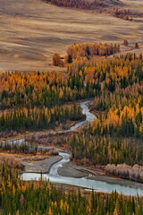 Russia, Gorny Altai. View from the mountain pass to the autumn Chuya River along the Chuya tract in...