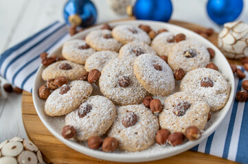 Christmas Hazelnut cookies on plate with decoration