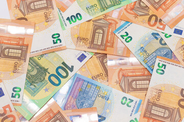 Different Euro Banknotes Money Background. Euro Money Currency. Colored Paper Money. A Lot of Fifty Euro Bills. Business, Finances, Cash and Money Saving Concept