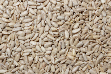 Peeled Sunflower Seeds Background: A Culinary Canvas of Shell-free Sunflower Seeds, Creating a Lively and Textured Background for Gourmet Cooking - Top View, Flat Lay