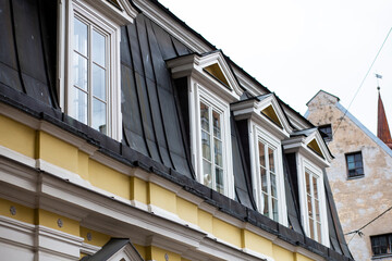 Roof windows in a typical old art nouveau building architecture in Riga, Latvia