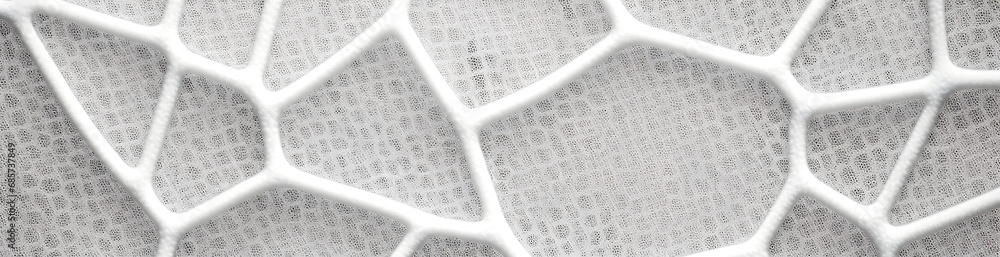 Wall mural close-up image of a foam structure with a white, interconnected web pattern on a bubbly grey backgro