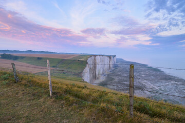 Coast and high cliffs near Ault at sunrise in summer
