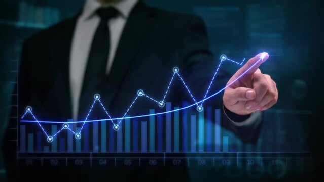 Financial Broker in Suit Drawing an Ascending Line and Bar Graph showing Quarter Profits Earnings Forecast. Man Hand showing Record Earnings, Corporate Growth, Business Success in Virtual or Augmented