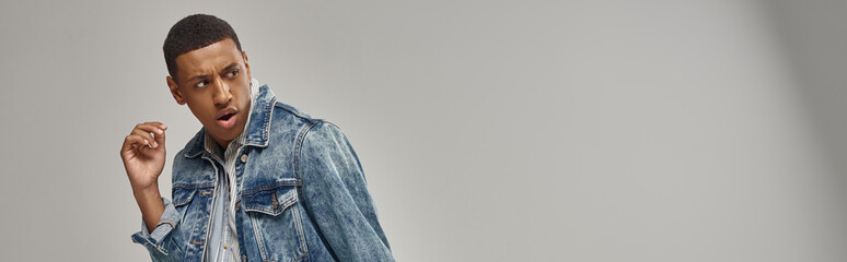 Fototapeta premium good looking emotional african american male model in denim outfit, fashion concept, banner