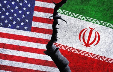 Iran vs USA concept flags on a wall with a crack. United States of America and Iran political conflict, economy, war crisis, relationship, trade, sanctions concept