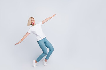 Full length photo of good mood nice girl with bob hair dressed white t-shirt hold arms like wings...