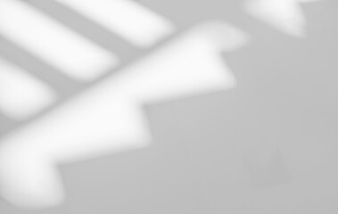 Abstract light reflection and grey shadow from window on white wall background. Gray window shadows and sunshine stripe diagonal geometric overlay effect for backdrop and mockup design