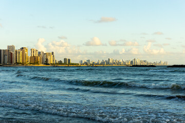 At the Beach of Candeias early in the morning, just after sunrise. The City of Recife, Brazil is to...