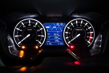 Light with car mileage with black background,number of speed,Odometer of car. - obrazy, fototapety, plakaty