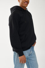 trendy african american male model in casual black hoodie and jeans, copy space for advertising