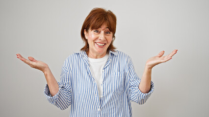 Middle age woman standing clueless over isolated white background