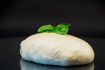 homemade yeast soft dough on black background