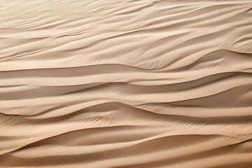 Fototapeta na wymiar Close-up of textured sand dunes creating natural patterns.