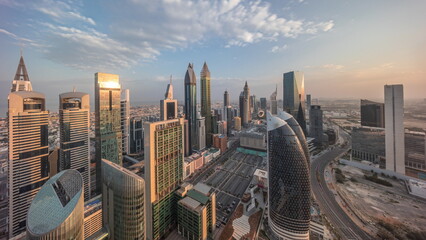 Skyline view of the high-rise buildings on Sheikh Zayed Road in Dubai aerial all day timelapse, UAE.
